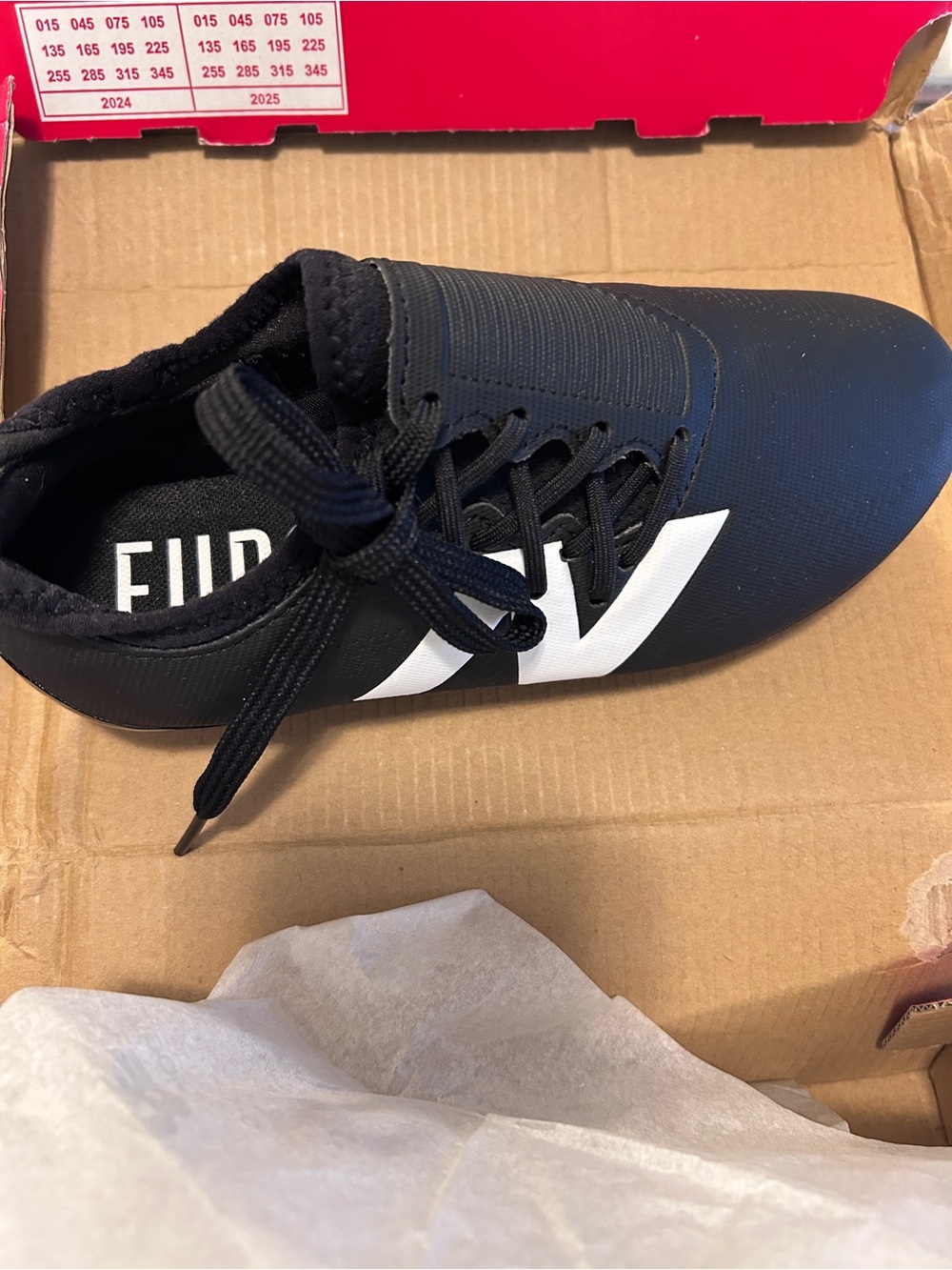 New Balance Black Athletic Kids Soccer Cleats with White Logo